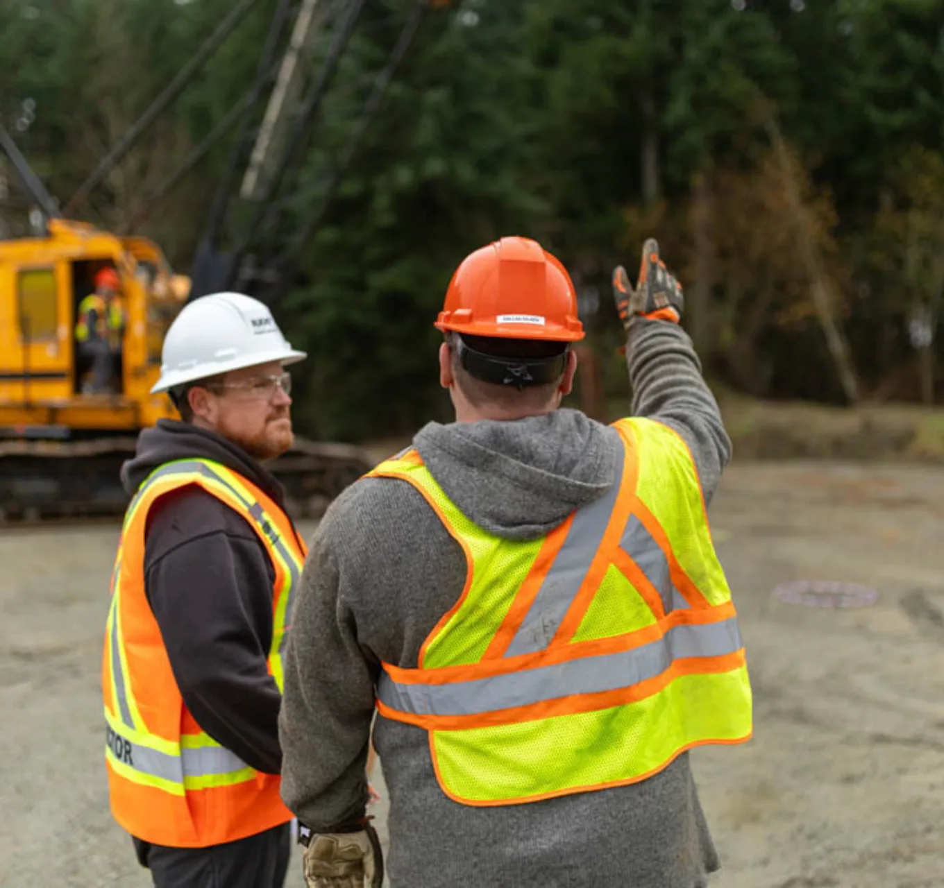 A worker informs his supervisor in the field.