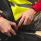 A worker using a seatbelt